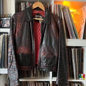 Vintage 90’s DKNY jeans Black Leather Jacket with Red Quilted Lining M